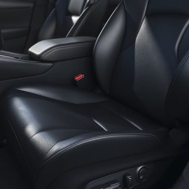2026 Honda Accord Black interior detail view of the lower portion of the drivers seat and adjustable seat buttons.